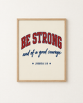 Be Strong: Varsity print in an oak frame on a white wall, reading “Be strong and of a good courage” (Joshua 1:9, KJV). Digital mockup.