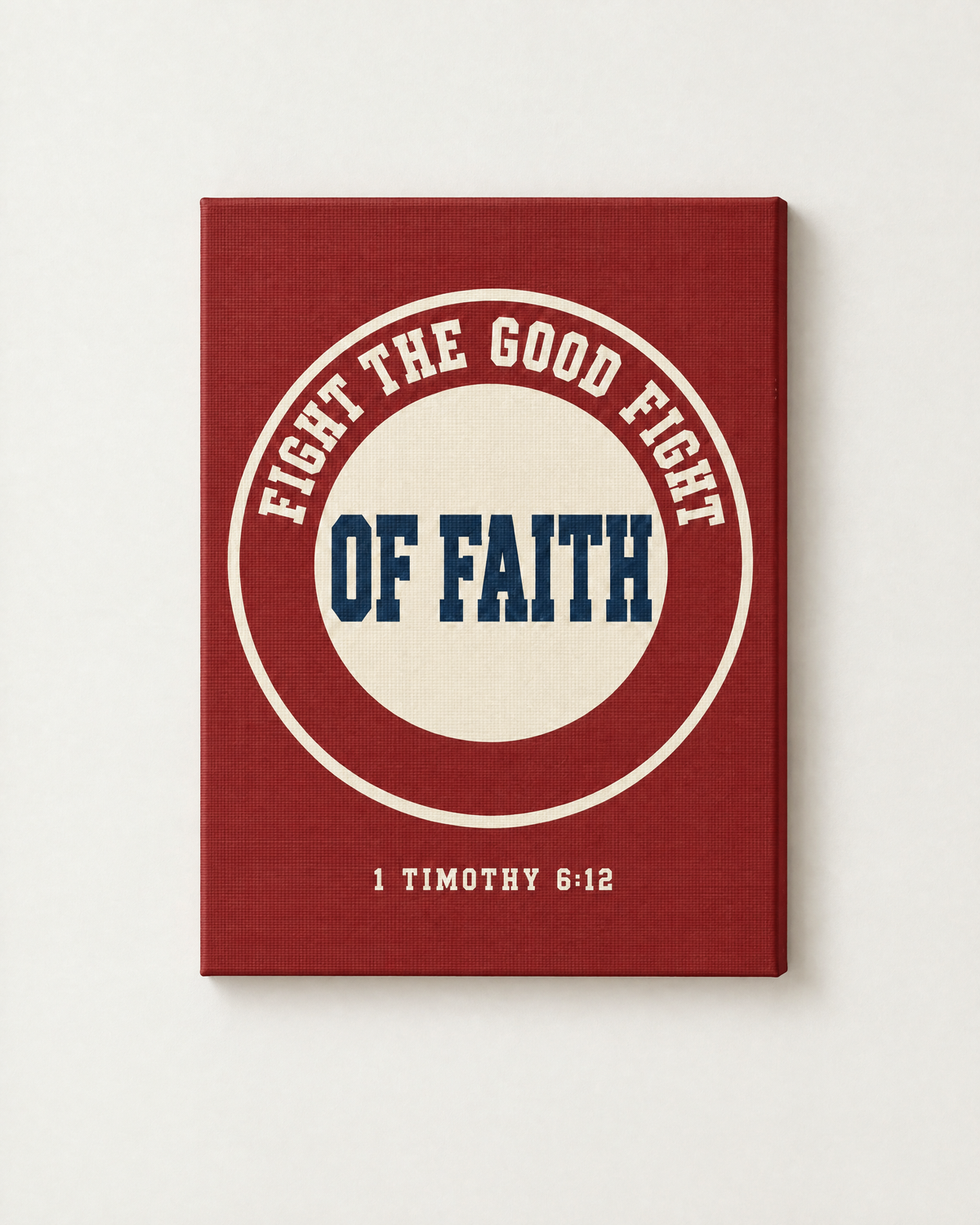 Fight the Good Fight: Varsity print as a gallery-wrapped canvas on a white wall, reading “Fight the good fight of faith” (1 Timothy 6:12, KJV). Digital mockup.