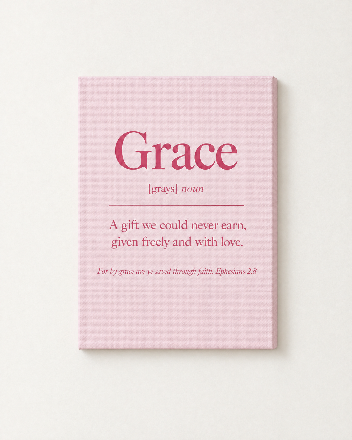 Grace: Blush print as a gallery-wrapped canvas on a white wall, reading “For by grace are ye saved through faith” (Ephesians 2:8, KJV). Digital mockup.