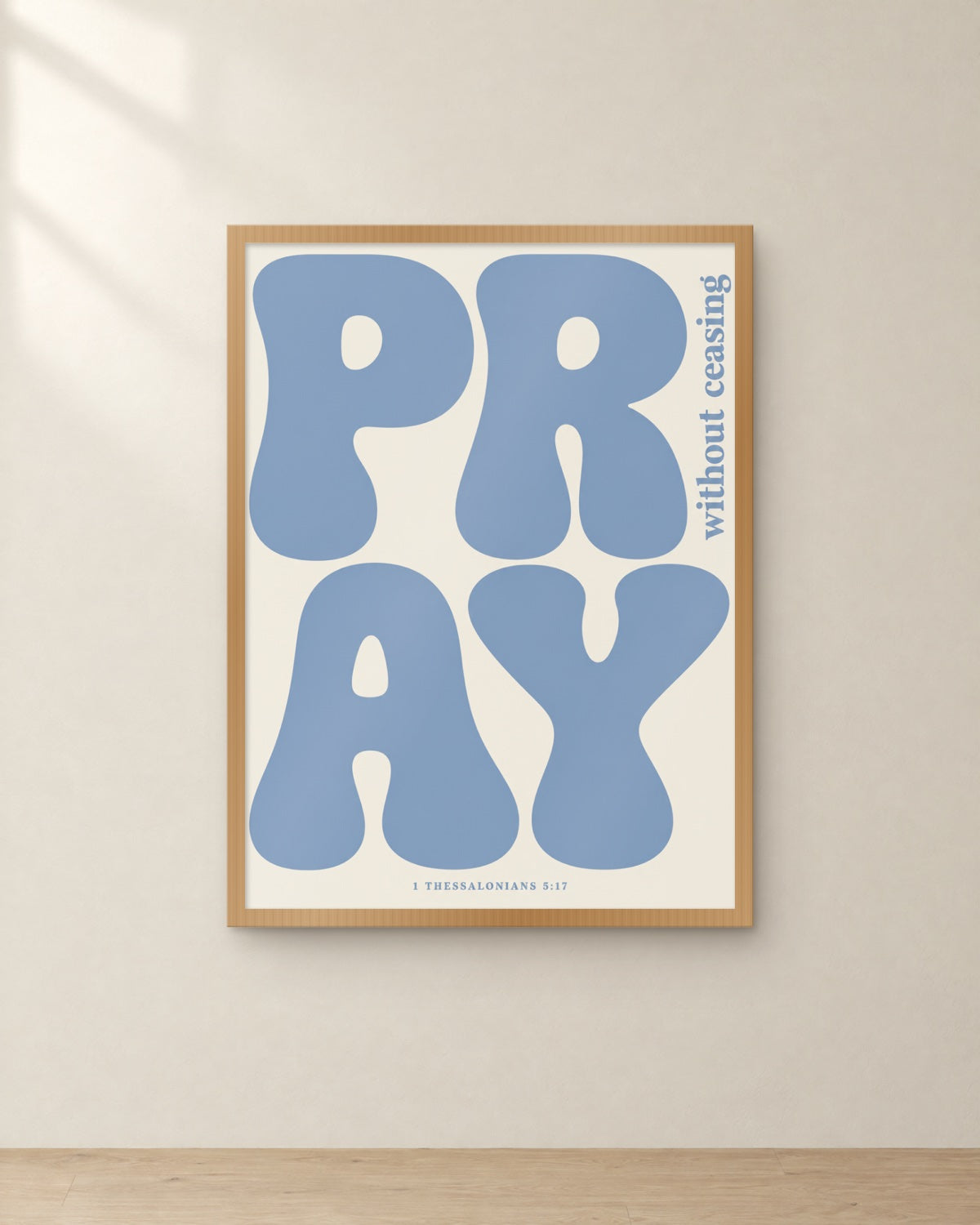 Pray, 1 Thessalonians 5:17, framed in oak. Digital mockup.